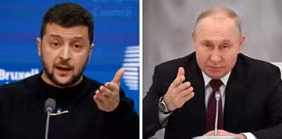 (COMBO) This combination of file pictures created on February 13, 2023 shows Ukraininan President Volodymyr Zelensky giving a press conference as part of a EU summit in Brussels, on February 9, 2023 and Russian President Vladimir Putin chairing a meeting with secretaries of foreign security councils at the Kremlin in Moscow on February 8, 2023. (Photo by Ludovic MARIN and Grigory SYSOYEV / various sources / AFP)
