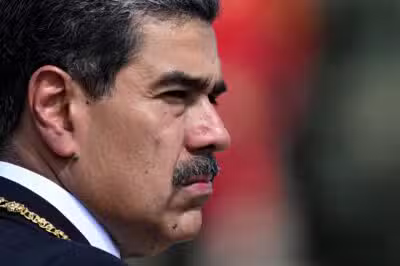 Venezuela's President Nicolas Maduro gestures during a ceremony at Fort Tiuna military base within the presidential inauguration in Caracas on January 10, 2025. Maduro, in power since 2013, took the oath of office for a third term despite a global outcry that brought thousands out in protest on the ceremony's eve. (Photo by Juan BARRETO / AFP)