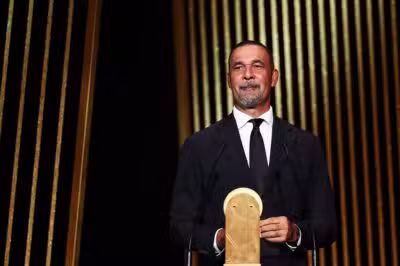 Former Dutch football player Ruud Gullit speaks on stage to give the Kopa Trophy for best under-21 player during the 2024 Ballon d'Or France Football award ceremony at the Theatre du Chatelet in Paris on October 28, 2024. (Photo by FRANCK FIFE / AFP)